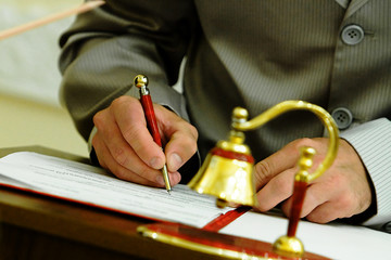 Groom signing