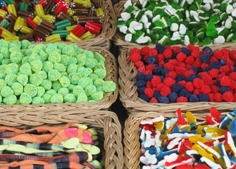 Colorful candies in baskets