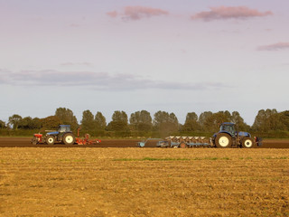 Obraz premium plowing rolling and drilling