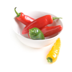 traffic light chilly pepper in a small  round white bowl, small
