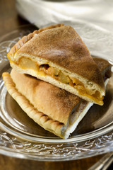 Sicily - Italy . A tipical potato pie on a glass plate