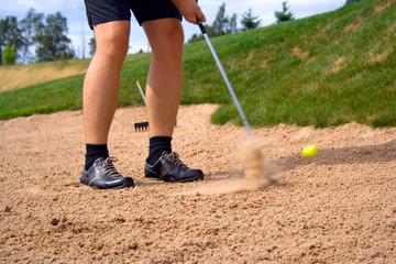 golf shot in sand