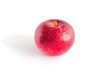 Red apple with drops of water