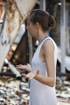 woman and burned out home