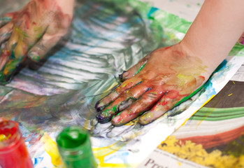 Little Children Hands doing Fingerpainting