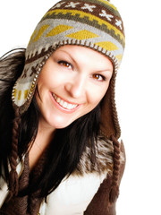 closeup of smiling brunette woman in winter clothes