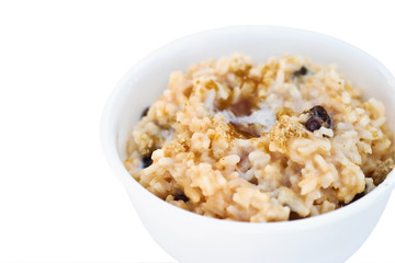 Sweet pumpkin rice with brown sugar sprinkled on top.