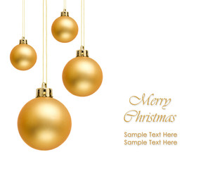 Golden christmas balls over white background