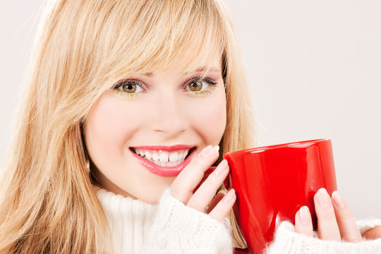 Happy Teenage Girl With Red Mug