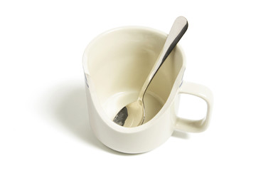 Spoon in Broken Mug