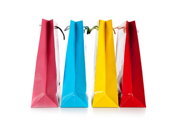 Group of colorful shopping bags on white