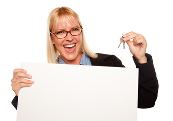 Attractive Blonde Holding Keys and Blank White Sign