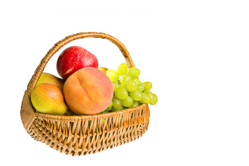 hamper with fruits isolated on the white background