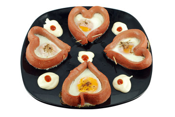lovers breakfast with eggs and frankfurters