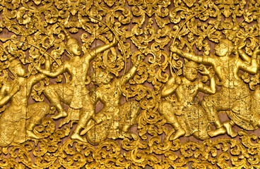 The ramayana epic carved on a wood door. Luang Prabang.