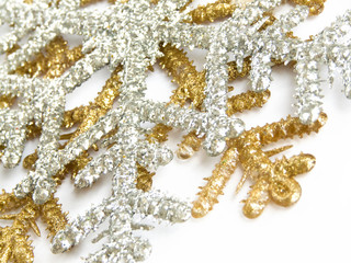 Golden and silver snowflake closeup.