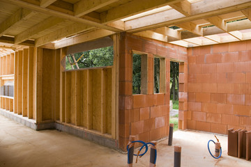part of a wood and brick house construction