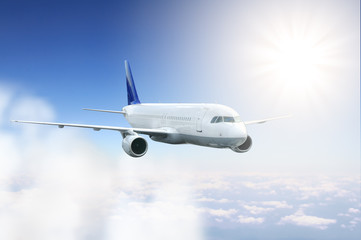 Fototapeta na wymiar Samolot latający na niebie