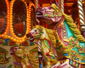 A Group of Carousel Horses on a Fun Fair Ride.