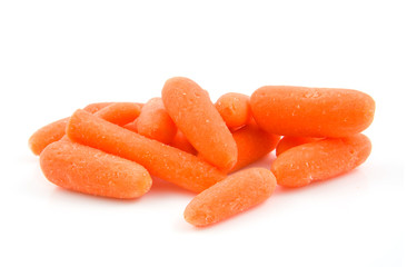 fresh raw carrots over white background