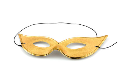 Golden party mask over white background