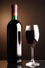 Glass and bottle of red wine