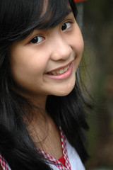 Fototapeta premium little girl with nice smile expression