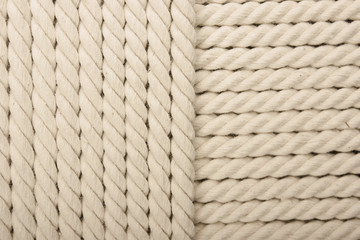 Heavy, white coiled rope.