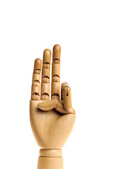 Wooden, human hand isolated on a white background