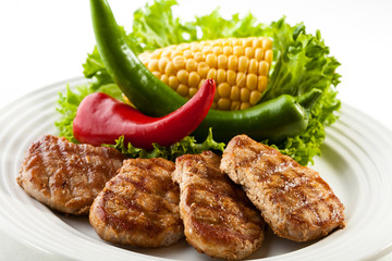 Grilled steaks  and vegetables