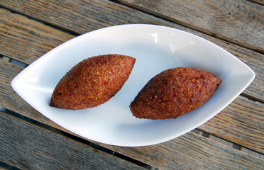 two turkish icli koefte meatballs