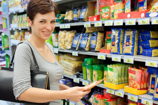 woman at supermarket all logos blurred