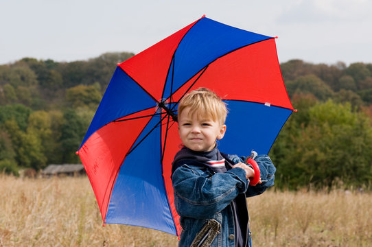 Little Boy With Umbrella