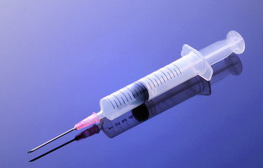 Hypodermic syringe and reflection