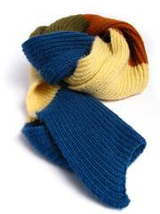 red, blue and yellow woolen scarf on white background