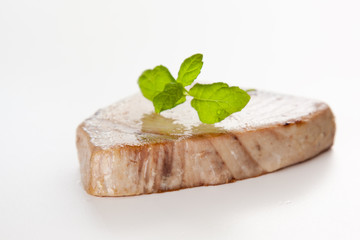 tasty tuna steak prepared whith fresh vegetables isolated