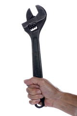 adjustable spanner in hand isolated