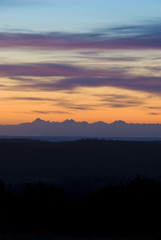 Obraz premium Vibrant blue orange sunrise over swedish mountains