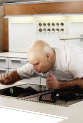 Man cleaning kitchen