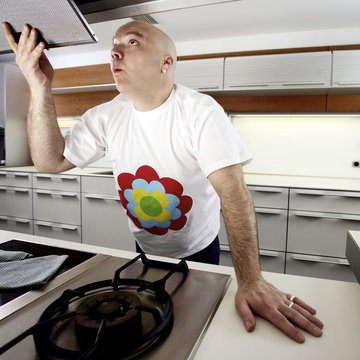 Man cleaning kitchen