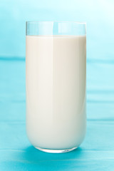 Fresh glass of milk isolated over white