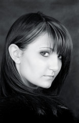 Fototapeta premium Charming young woman. Portrait in black & white