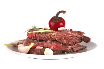 beef meat chunk on grey dish