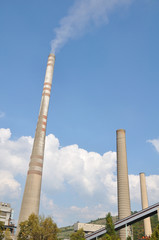 Industry, two tall chimneys