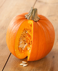 Cut Pumpkin Exposing Seeds