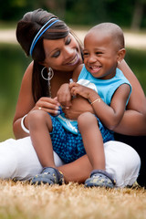 Mother is playing with her son