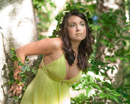 Nymph hugging a tree