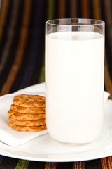 Fresh glass of milk and a few Cookies