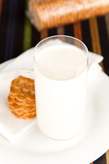 Fresh glass of milk and a few Cookies