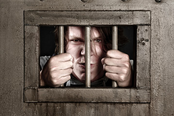 CP of a man behind bars